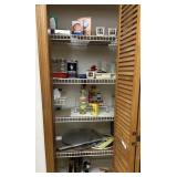 Pantry full - cooking,  pizza trays, silverware, c