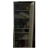 White storage cabinet with contents - Brita filter