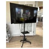 Amazon 56" fire tv on wheeled tv stand