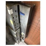 SS low 8 wheel griddle table 109" x 40" x 23"