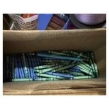 Wooden crate with clipboards, crayons