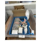 Label dispenser, plastic bags, scrub brush & servi
