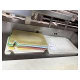 9 plastic cutting boards 18" - 23" L
