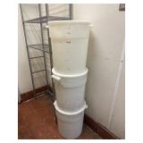 3 plastic 22quart lidded storage containers