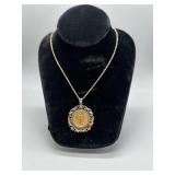 1/4 ox $10 1997 gold coin set into 14kt bezel with