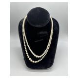 Two graduating pearl necklaces (1) 10kt clasps and