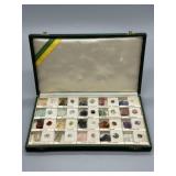 20 precious gemstone and gem in green presentation