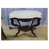 Marbletop Walnut lamp table with carved dog under