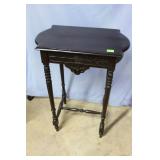 Rectangular lamp table with rounded ends, carved s