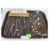 Mixed costume, bracelets, necklaces