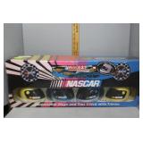 NASCAR collectable mugs and tins filled w/ cocoa,