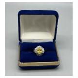 10kt ring with citrine center stone and a burst of