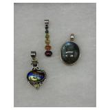 Three Sterling pendants with multicolored stones -