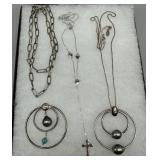 Three sterling necklaces incl cross, two complemen