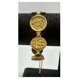 14kt yellow gold Asian character bracelet - 24.0 g