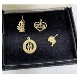 Four 14kt Romantic pendants incl 'Wedding',