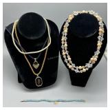 Three rope necklaces with 14kt clasps, aquamarine