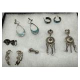 Six sterling and Mexican silver earrings and one