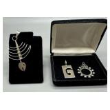 Three Sterling & Mexican Silver Pendants - 19.8