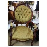 Medallion backed parlor chair with button tucked f
