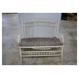White wicker love seat with floral cushion - 44" x