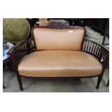 Parlor settee ribbed arms, ribbon carved back, bea