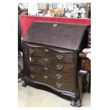 Slant front mahogany writing desk, double serpenti