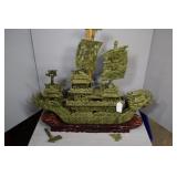 Jade dragon ship with repairs and damage