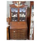 Dropfront secretary with four drawers, paw feet, a
