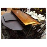 Baker furniture pedestal dining table with brass p