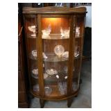 Oak bow front lighted china cabinet