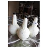 Three 1939 World's Fair milk glass bottles