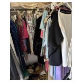 Select office closet contents - hats, purses, sign