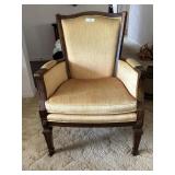 Armchair in yellow velveteen fabric