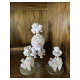 Three Pink ceramic spaghetti poodles