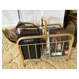 magazine rack with DVDs & cassette tapes