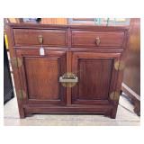 Chinese style entry cabinet with brass hardware
