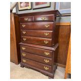 Upright mahogany eight drawer dresser with brass