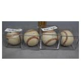 Four Autographed Baseballs in Lucite Case incl