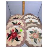 Seven hand woven floral seat cushions