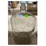 Six gallon clear water jug