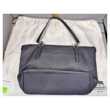 Navy Coach purse with dust jacket