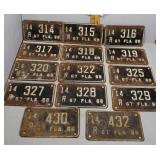 Fourteen Florida motorcycle license plates - new o