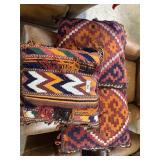 Three woven Native American throw pillows