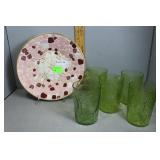 Five green depression water glasses and mosaic pla