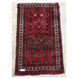 Hand knotted throw rug 43" x 26" in red tones