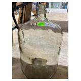 Six gallon clear water jug