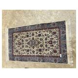 Hand knotted throw rug 68" x 38" in blue &  red to