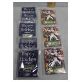 8 packs of NFL trading cards incl Happy Holidays