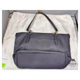 Navy Coach purse with dust jacket